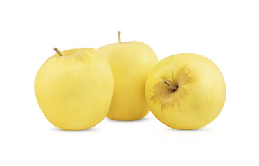 Three yellow Golden Delicious apples are isolated on a transparent  background.