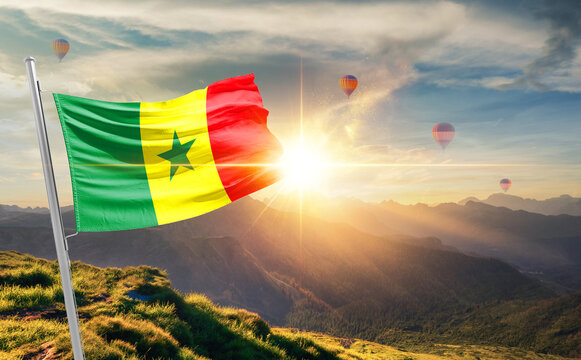 Senegal flag waving in beautiful scenery. Senegal national flag for independence day.