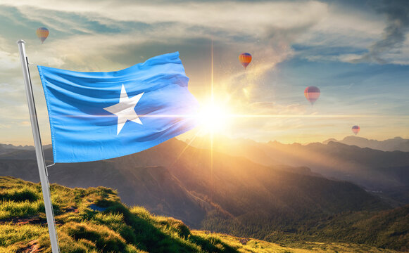 Somalia flag waving in beautiful scenery. Somalia national flag for independence day.