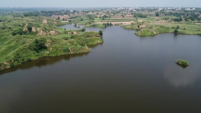 dungi dam lake view in gujjar khan rawalpindi pakistan showing natural water reservoir and surrounding landscape