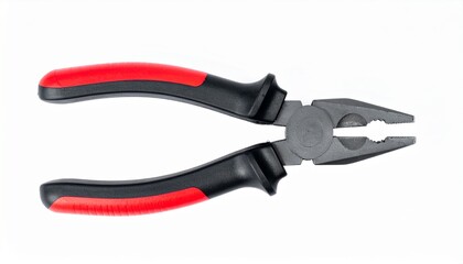 Obraz premium A single pair of lineman's combination pliers featuring comfortable red and black insulated grips, isolated on a clean white background for studio shot
