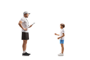 Boy talking to a male physical edication teacher