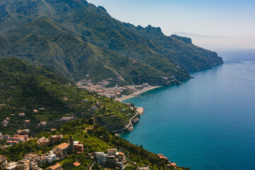 Obraz premium Aerial panoramic view of Minori and Maiori towns on the Amalfi Coast, Italy, Mediterranean seaside landscape, summer travel destination, coastal architecture and authentic Italian lifestyle 