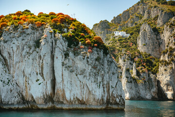Dramatic limestone cliffs and turquoise waters near Capri on the Amalfi Coast, Italy, famous Mediterranean landscape and popular travel destination for tourism, boating and summer vacations in Europe