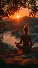 Serene Yoga Meditation at Sunset. Silhouette fitness woman doing Yoga in the morning.