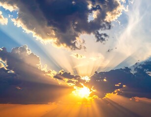 Dramatic sunset sky with sunbeams through clouds