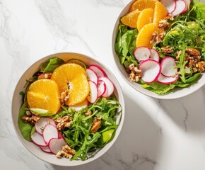 Vegan salad bowl with oranges, spinach, arugula, radish, nut.