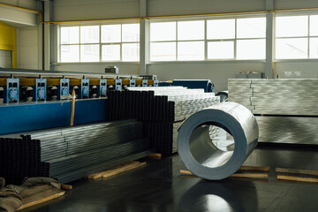 Industrial plant for the production of sheet metal in a steel mill