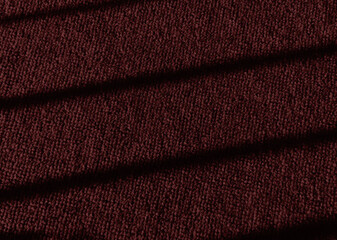 Fototapeta premium carpet texture background with jalousie shadows