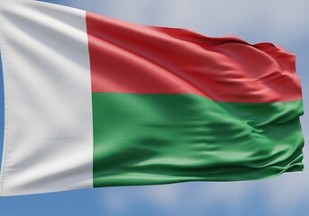 Obraz premium Flag of Madagascar waving in the blue sky