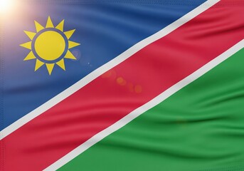 Vibrant flag of Namibia waving gracefully in the wind with a bright sun flare effect