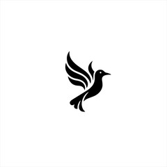Fototapeta premium Stylized black bird in flight with wings spread