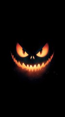 Fototapeta premium Spooky glowing pumpkin face with menacing expression in dark background during Halloween season
