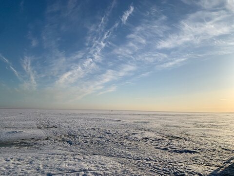 Winter landscape with frozen snowy lake and clear blue sunset sky. Perfect for calendars, wall art, and seasonal designs.

 - Powered by Adobe