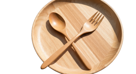 Wooden plate, fork, and spoon crossed