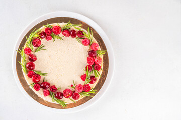 Christmas cheesecake with cranberries and rosemary