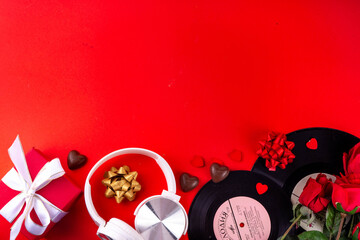 Vintage retro vinyl records with chocolates, decor, roses flower bouquet, gifts boxes