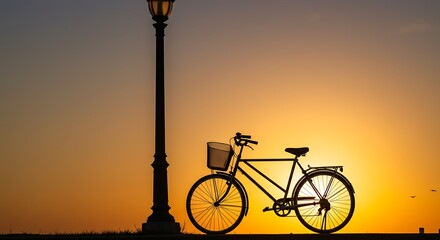 Golden Hour Pause Classic Bicycle and Lamppost Silhouetted Against a Radiant Sunset.