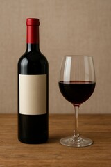 Red wine bottle and half full glass 