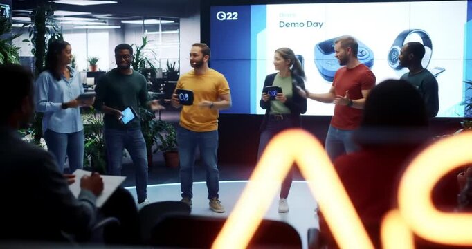 Team Collaboration at Tech Demo Day in Modern Office