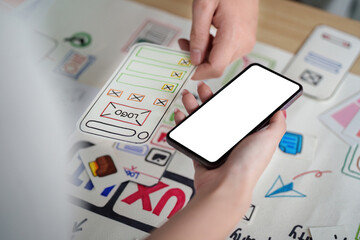 UX UI Design Collaboration with Smartphone and Sketches