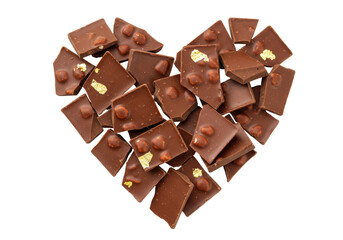 Isolated heart shape of broken chocolate pieces with nuts and edible gold leaf sweets