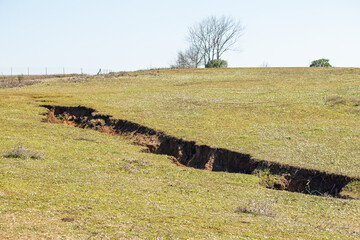 Fault line. Earthquake. Fault line visible from the surface. Ground motion.	