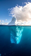 Iceberg half submerged in water, dramatic sky