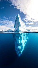 Iceberg submerged in water.  Vast expanse of ice, a powerful image