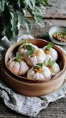 A bamboo steamer holds soft, peach-shaped pastries filled with sweet goodness, garnished with mint leaves. The rustic setting enhances the cultural charm of this delightful dish