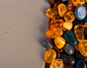 Multicolored gemstones on gray background
