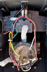 Device of a household steam generator for clothes. Appliance defect - leak.