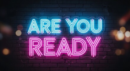 Vibrant neon sign, reading "Are You Ready?", affixed to a brick wall, exuding an energetic and inviting atmosphere.