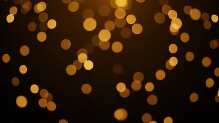 Golden Bokeh Lights on Black Background - Abstract video of out-of-focus golden lights on a dark background. Perfect for elegant or festive designs, adding a warm and luxurious feel.
