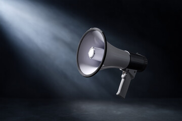 Megaphone in spotlight showcasing communication tools