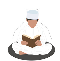 boy reading the Quran.  muslim boy reading Quran