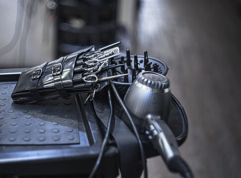 A professional haircutting tool designed for precision and comfort, perfect for barbers and stylists