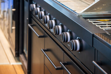 Elegant Modern Kitchen with Sleek Cooking Equipment and Stylish Design Elements