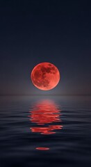A vibrant, blood-red moon hangs over a still body of water, its reflection mirroring the celestial spectacle.