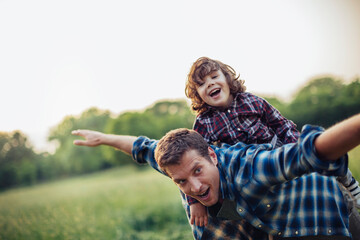 Father and son playing outdoors