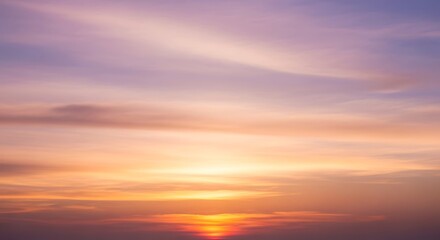 Fototapeta premium Serene Sunset Sky with Warm Hues and Clouds.