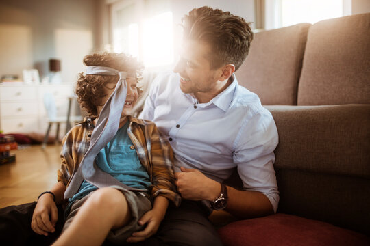 Father and son playing together