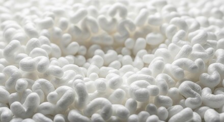 White styrofoam packing peanuts abstract background
