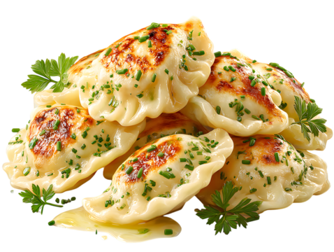 Delicious Golden Pierogi with Herbs and Melted Butter Garnish