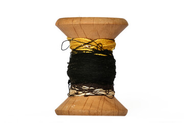 Antique wooden spool with thread rustic sewing concept