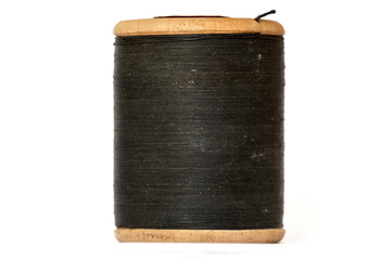 Antique wooden spool with thread rustic sewing concept