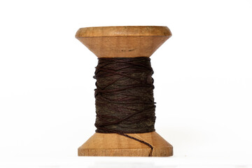 Traditional wooden spool vintage textile tool