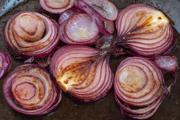fried red onion rings in a frying pan