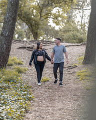 couple walking in the woods