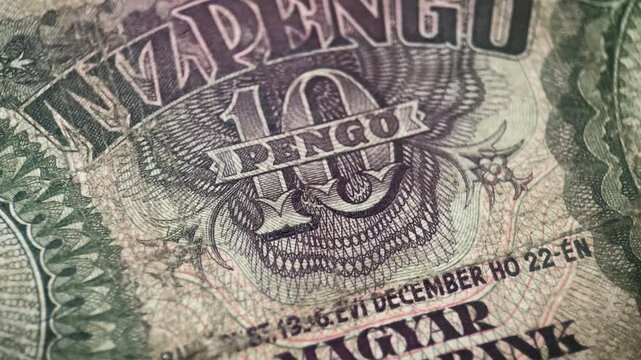 Old hungarian banknotes detailed closeup showcases a vintage ten pengo hungarian banknotes intricate details.